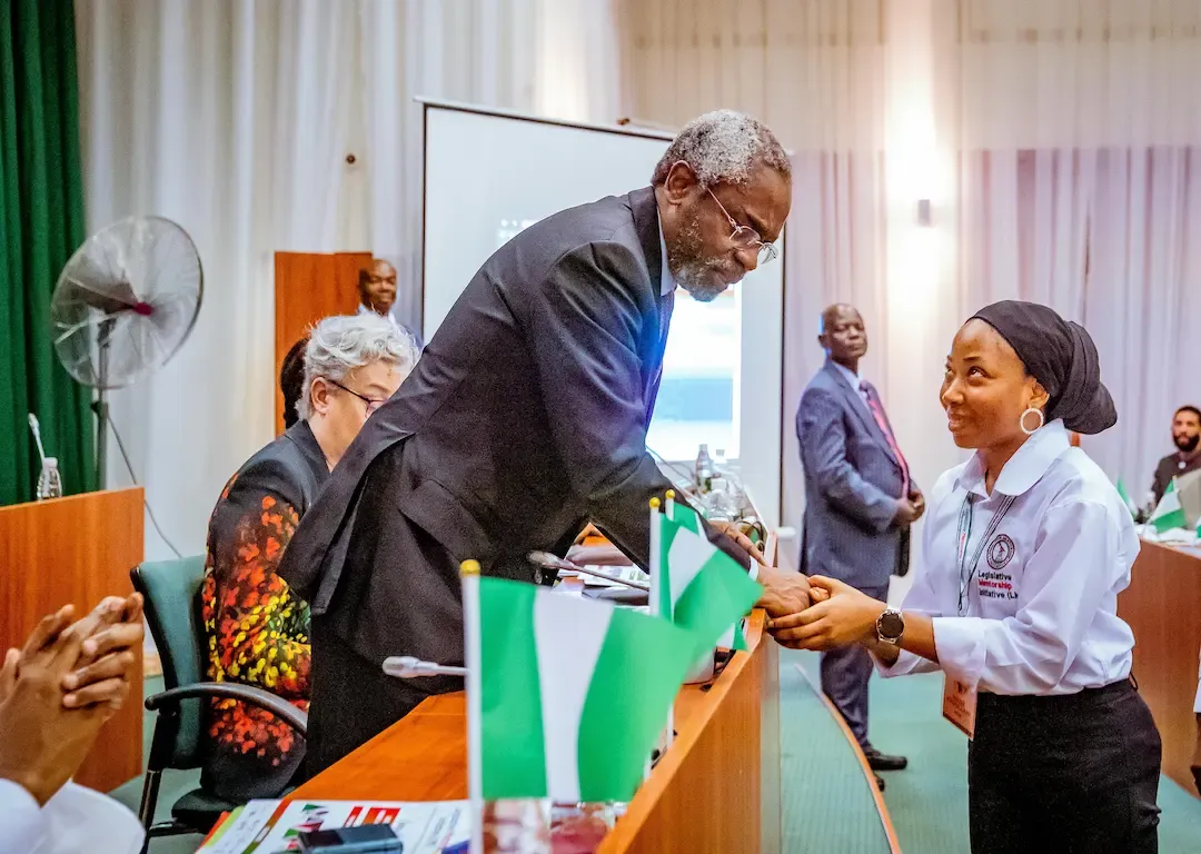 LMI fellows passing the baton at a ceremony